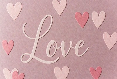Crafting a love-themed card with hearts