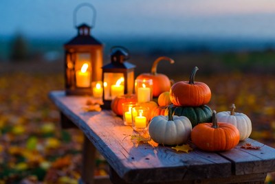 Autumn evening with pumpkins and lanterns