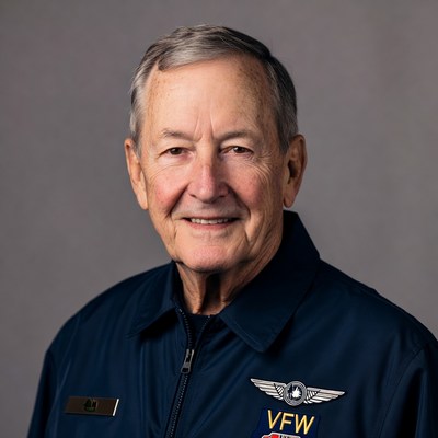 Veteran in uniform smiles at camera