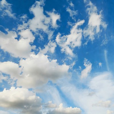 Clouds in a blue sky overhead