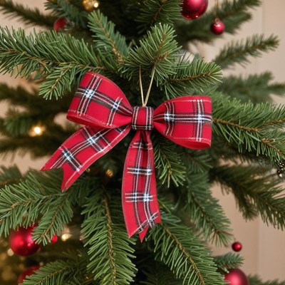 Red bow on christmas tree decoration