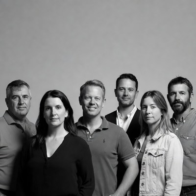 Group of friends smiling together indoors