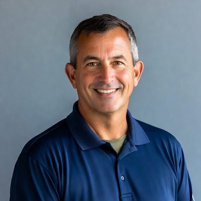 Man smiling in indoor setting