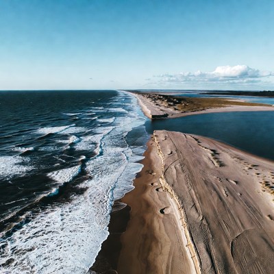 Shoreline meets water at coastline