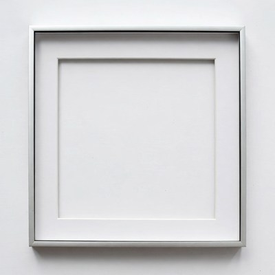 Empty frame on white wall