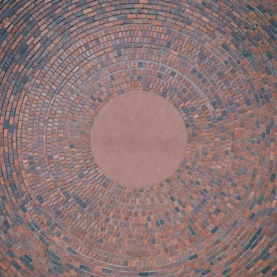 Circular design of brick pattern in plaza