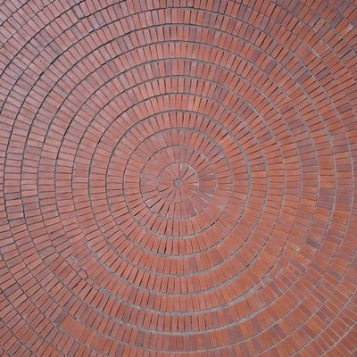 Circular brick pattern on ground