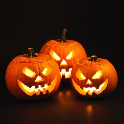 Carved pumpkins lit for halloween night