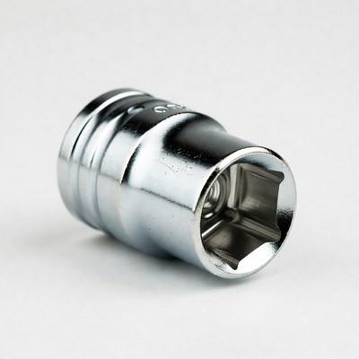 Metal socket tool on white background
