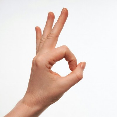 Hand gesture shows okay symbol