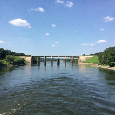 River flow under concrete bridge