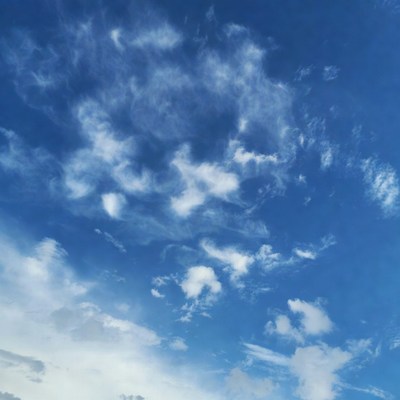 Bright sky with scattered clouds