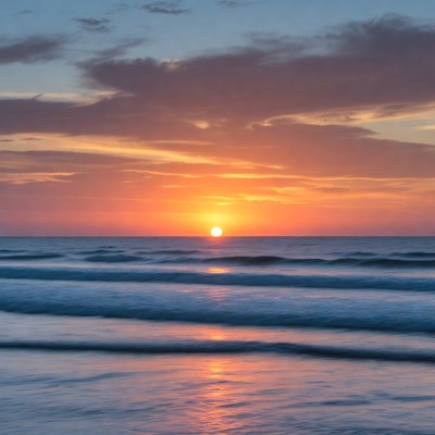 Sunset over the ocean horizon