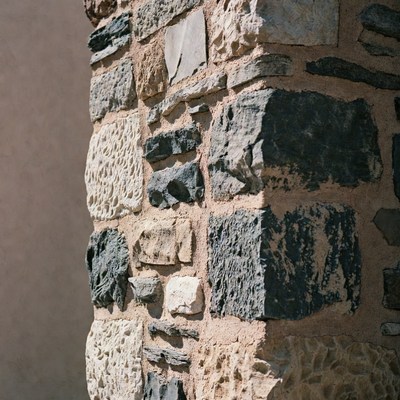 Stone wall detail in sunlight