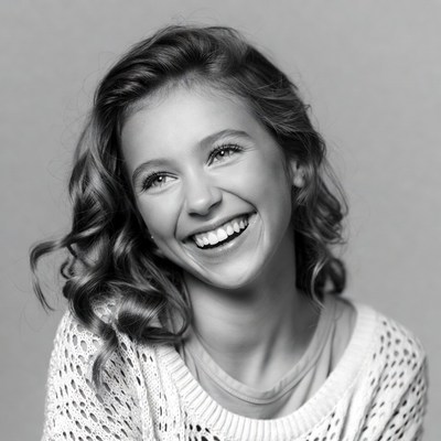 Girl smiling in black and white