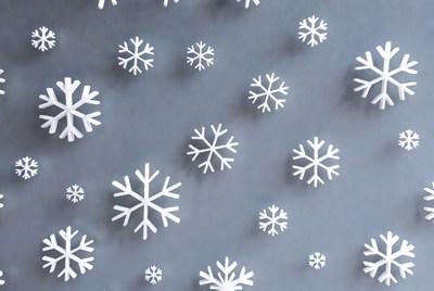 White snowflakes on gray surface