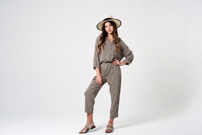 Stylish woman poses in studio