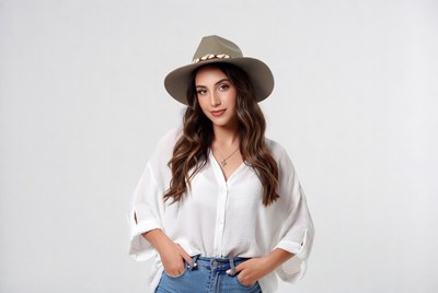 Woman in white shirt and hat