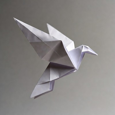 Crafting a paper bird in motion