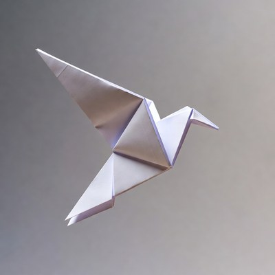 Origami bird in flight