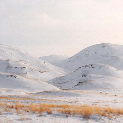 Snow-covered hills in winter landscape