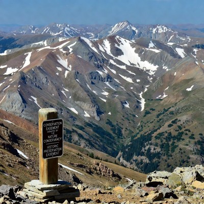 Mountain landscape with conservation sign