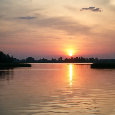 Sunset over calm water