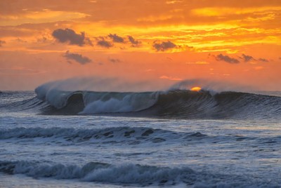Waves at sunset near ocean