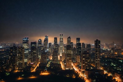 City skyline at night with lights