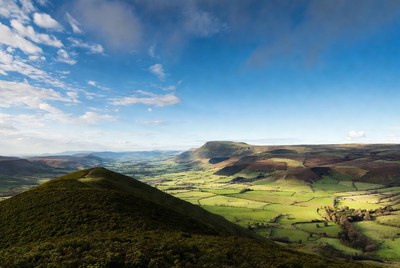 Rolling hills under a blue sky