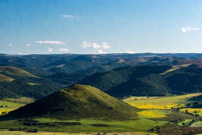 Scenic hills and valleys under clear sky