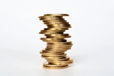 Stack of golden coins with spiral shape