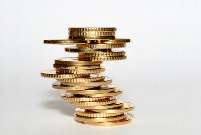 Stacked coins on white background