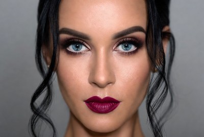 Model with dark makeup in portrait