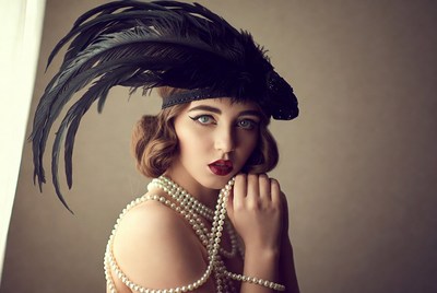 Vintage woman with feather headpiece