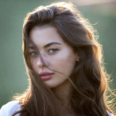Woman with flowing hair outdoors