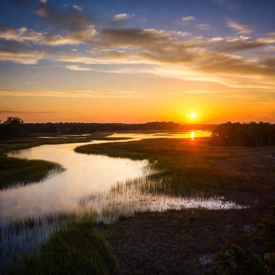 Sunset over the marshland river