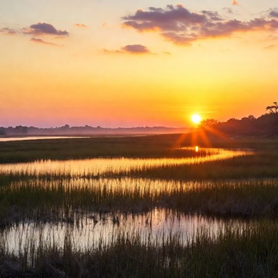 Sunset over a river and marsh