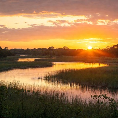 Sunset over a river landscape