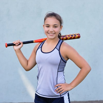 Young athlete prepares for softball practice