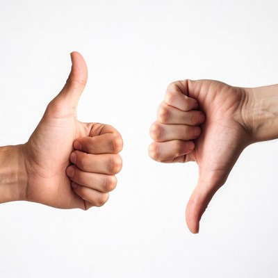 Hands showing thumbs up and down