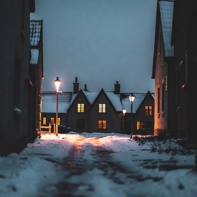 Winter evening in a snowy village