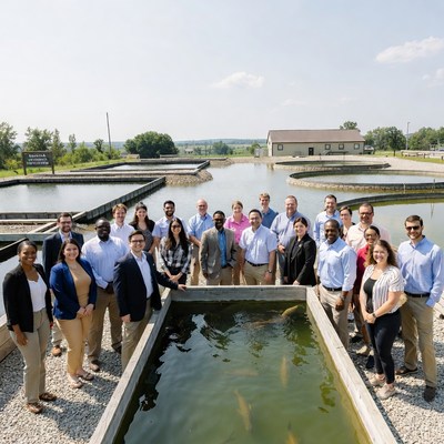 Group at fish farm in afternoon