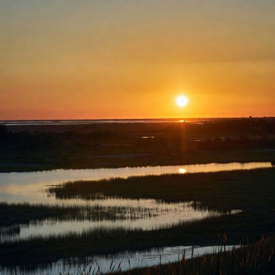 Sunset over the water at a quiet location