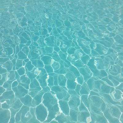Water surface at sunny pool