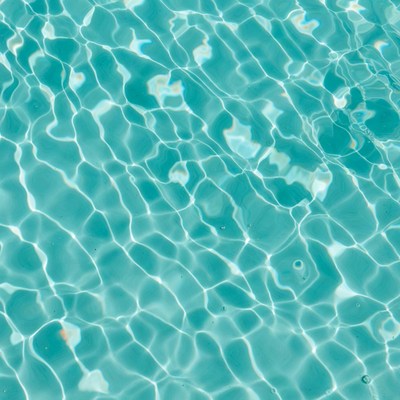 Clear water surface with sunlight reflections