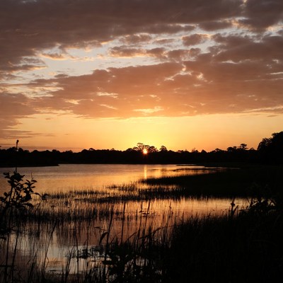 Sunset over a quiet lake