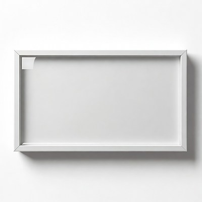 Empty frame on white wall