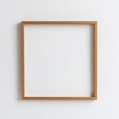 Empty frame on white wall
