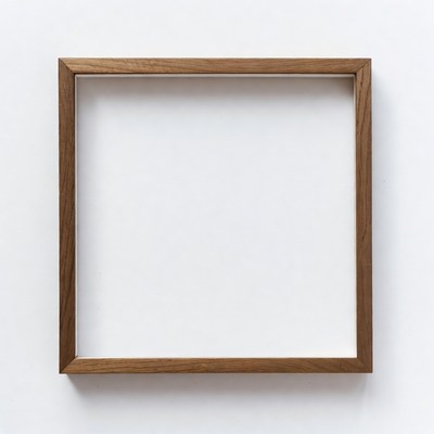 Empty wooden frame on white wall